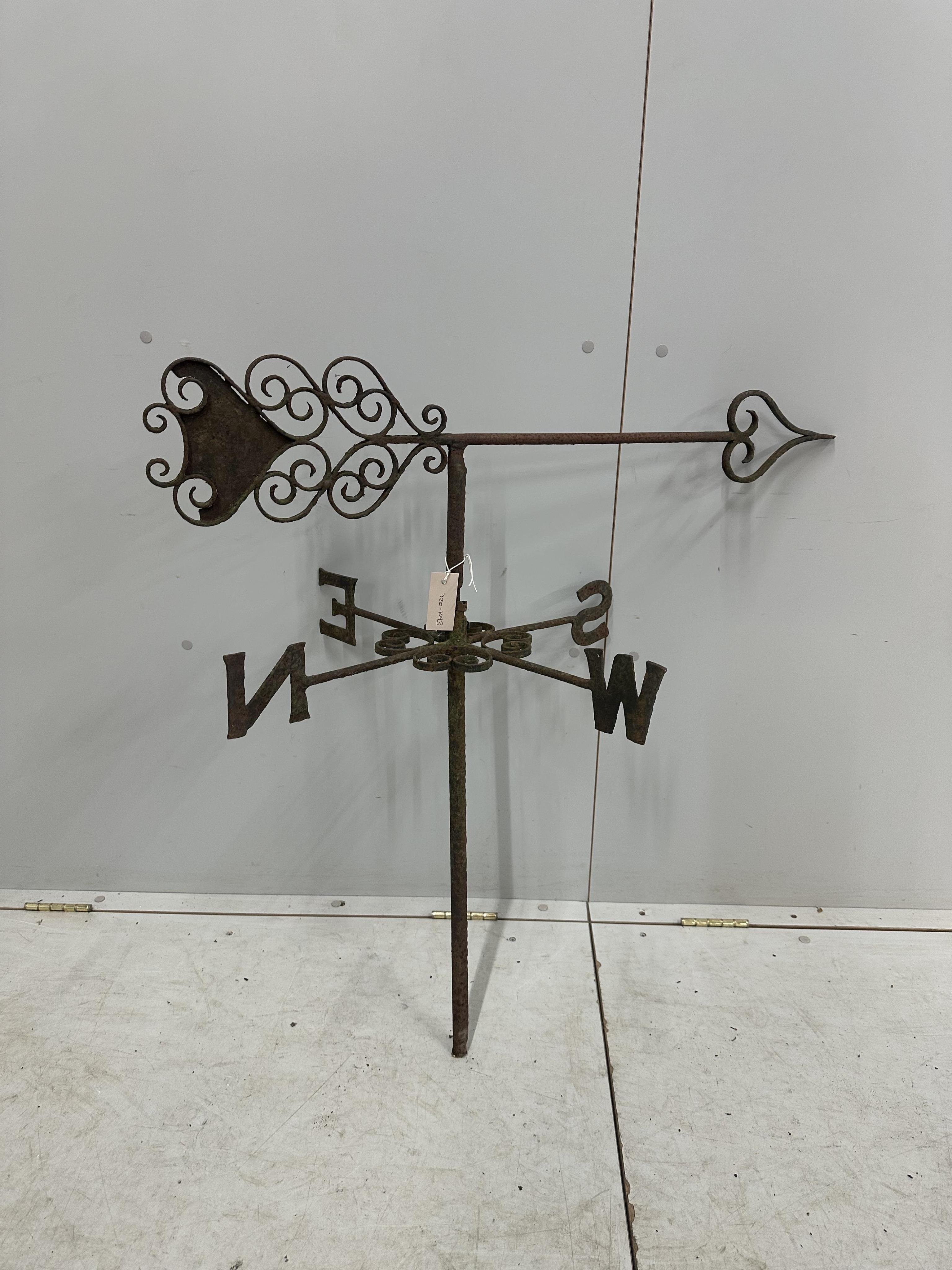 A wrought iron weather vane, height 90cm. Condition - poor to fair